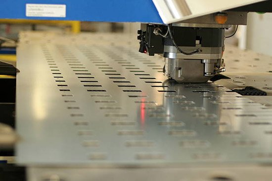 CNC turret punching of sheet metal