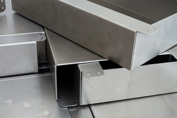 Sheet metal enclosure trays